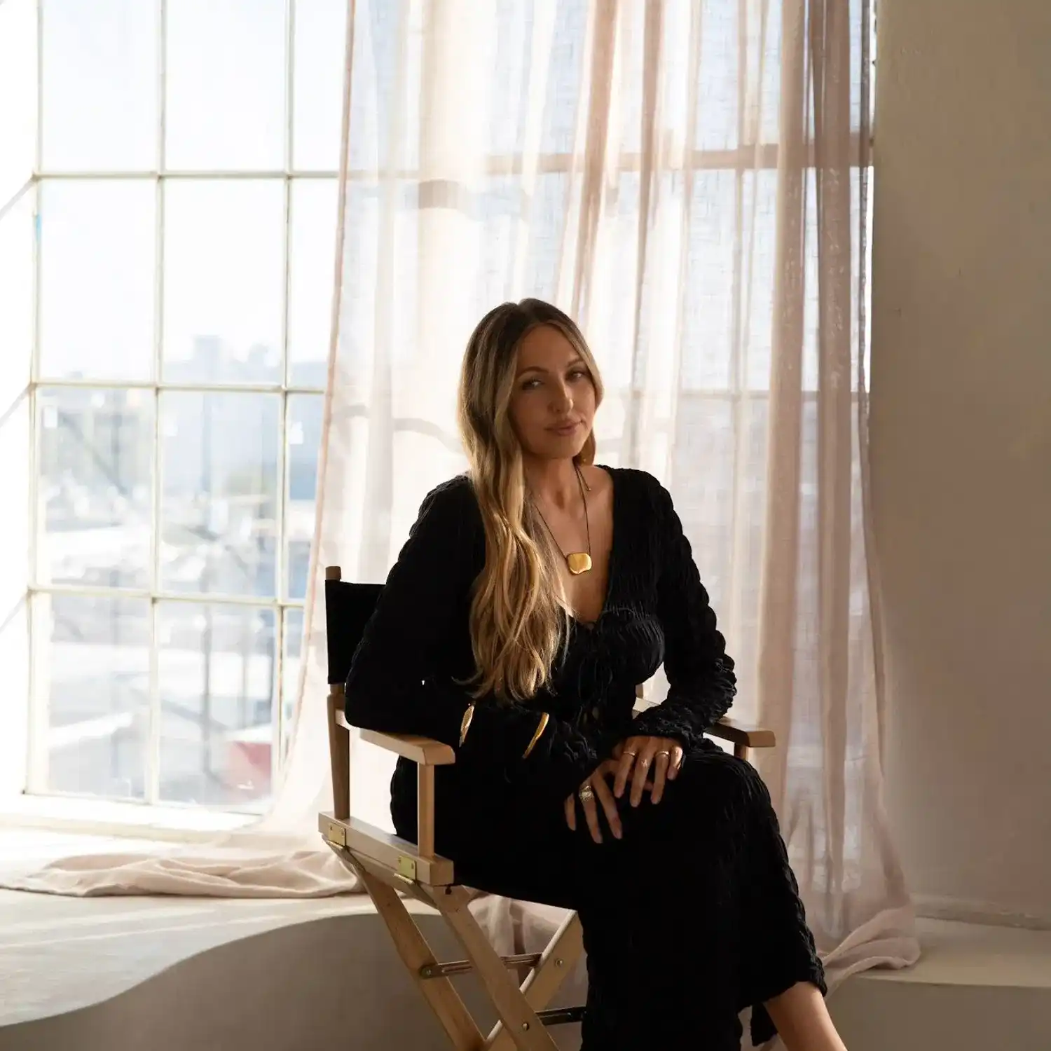 Portrait of Kristin Kurtz, a professional stylist at Stranded Salon, showcasing their expertise and style.