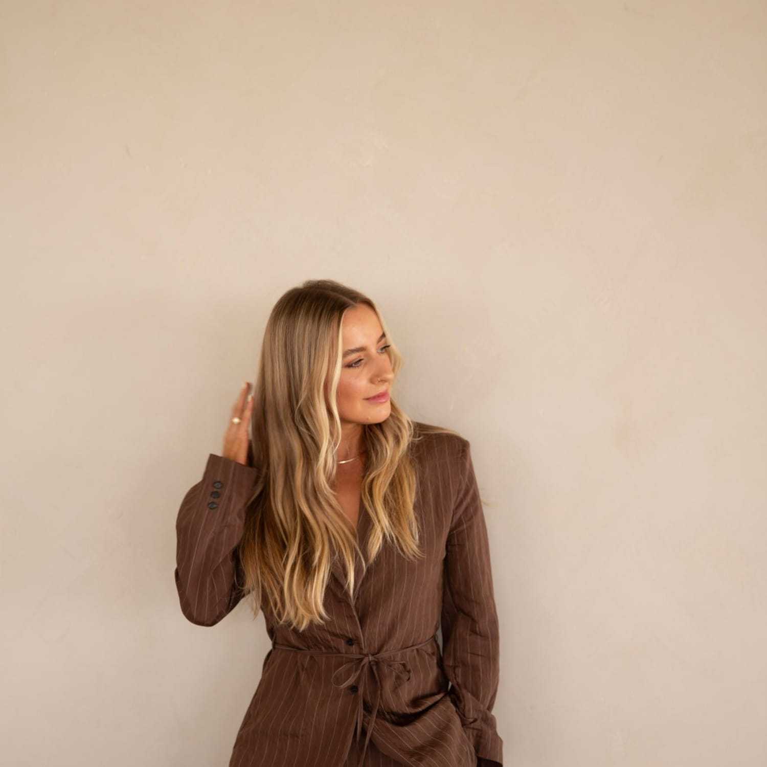 Portrait of Katherine Knight, a professional stylist at Stranded Salon, showcasing their expertise and style.