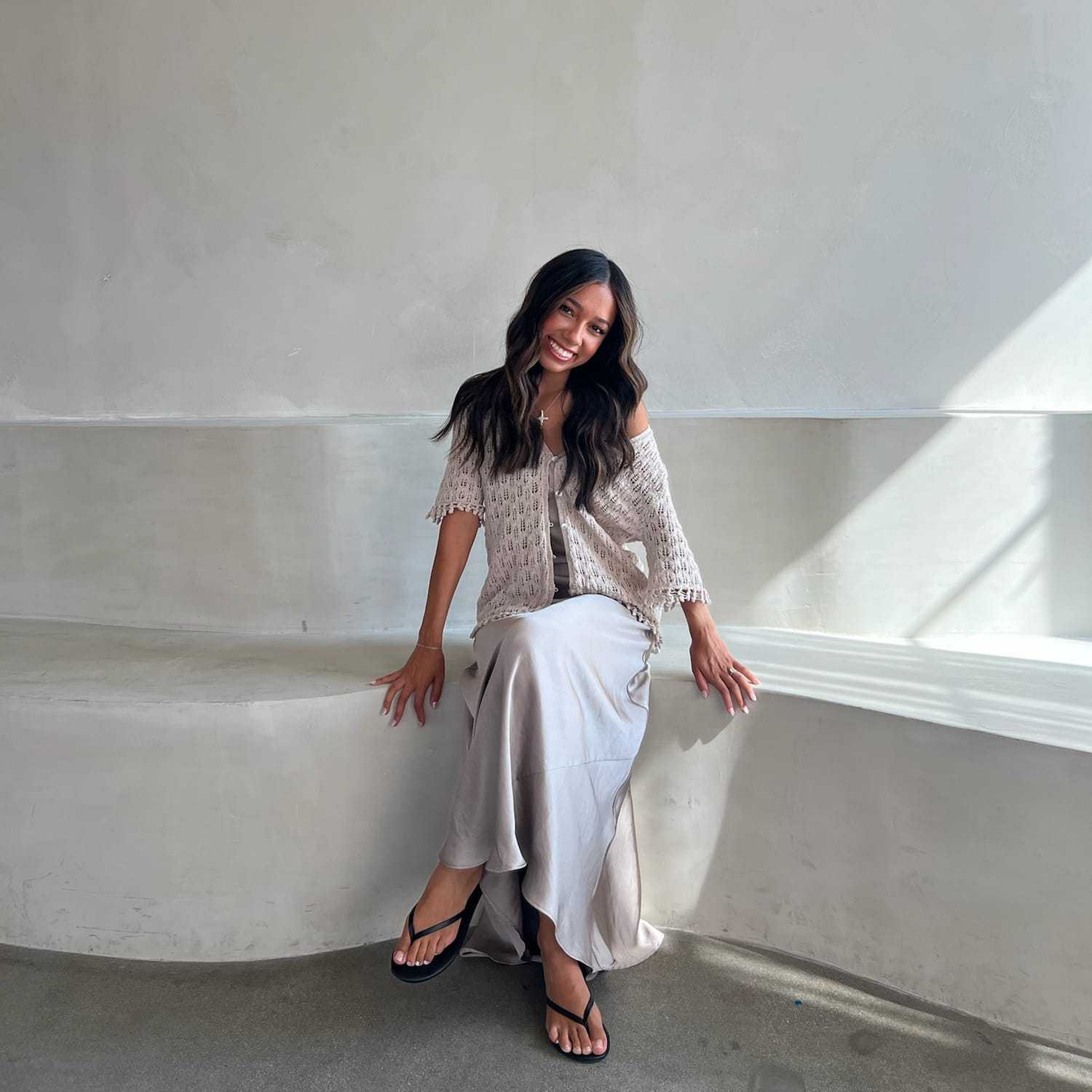 Portrait of Nathaly, a professional stylist at Stranded Salon, showcasing their expertise and style.