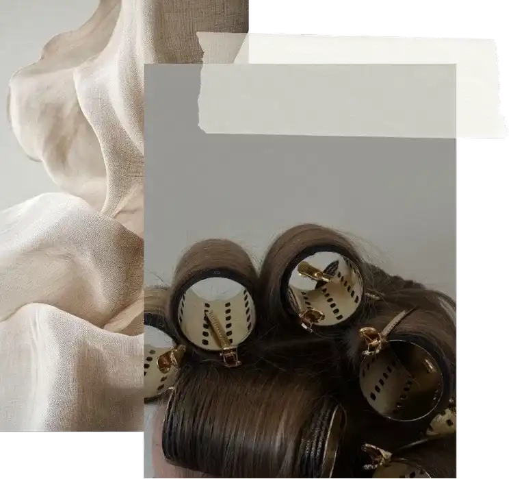 Hair in curl rollers with beige fabric background elements.