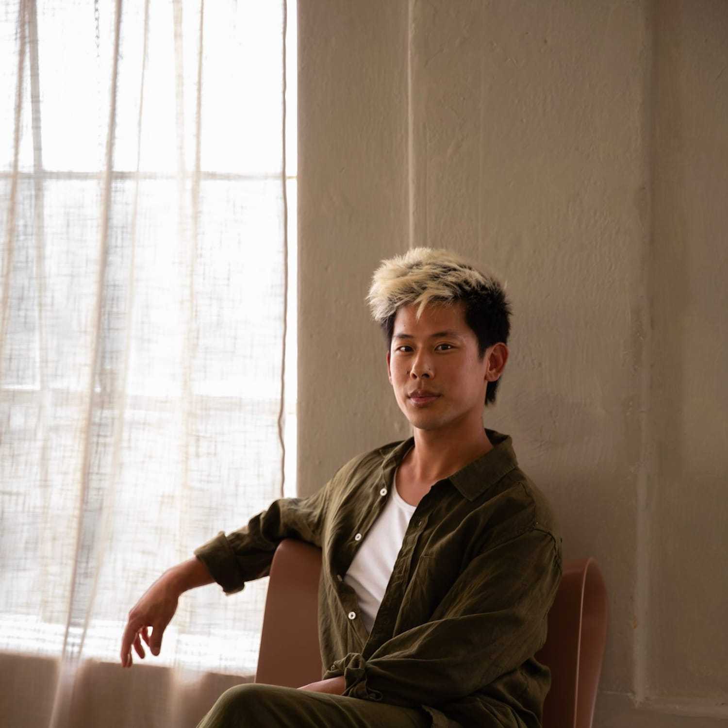 Portrait of Matthew Wang, a professional stylist at Stranded Salon, showcasing their expertise and style.